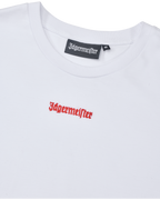 White cropped tee with orange Jägermeister logo.