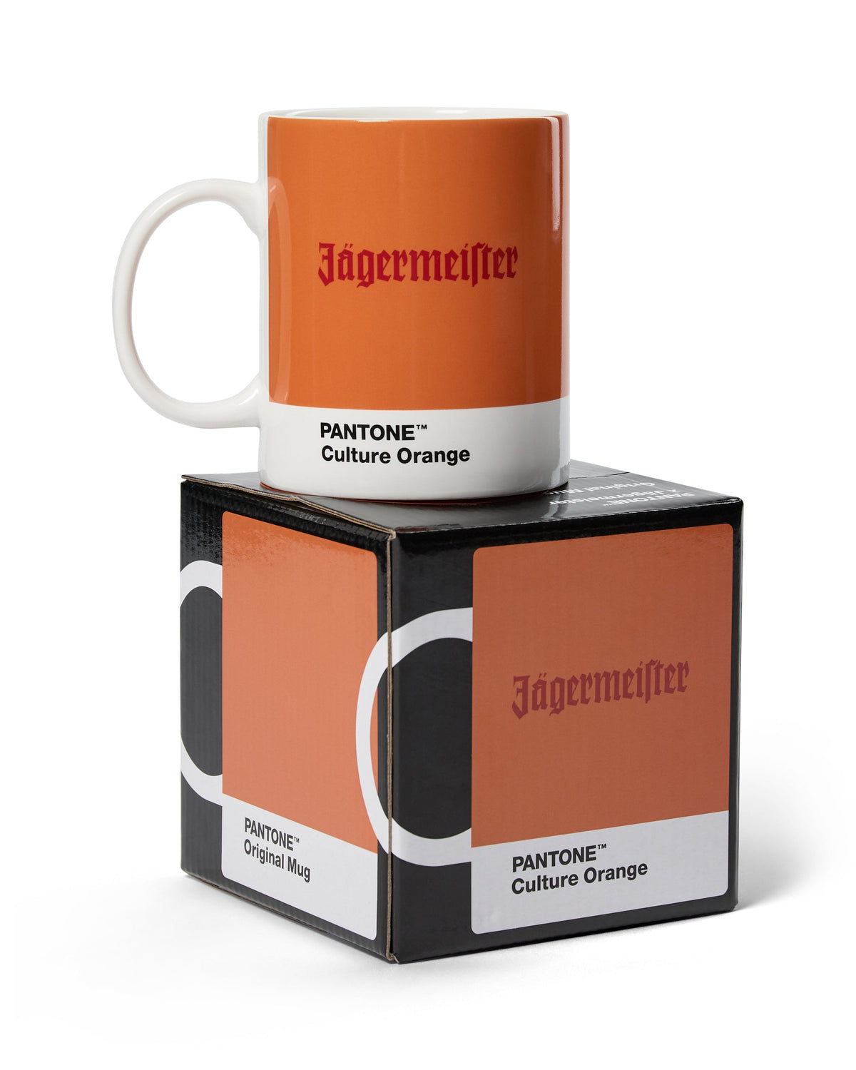 Narancssárga bögre Jägermeister márkajelzéssel a hozzá illő dobozon