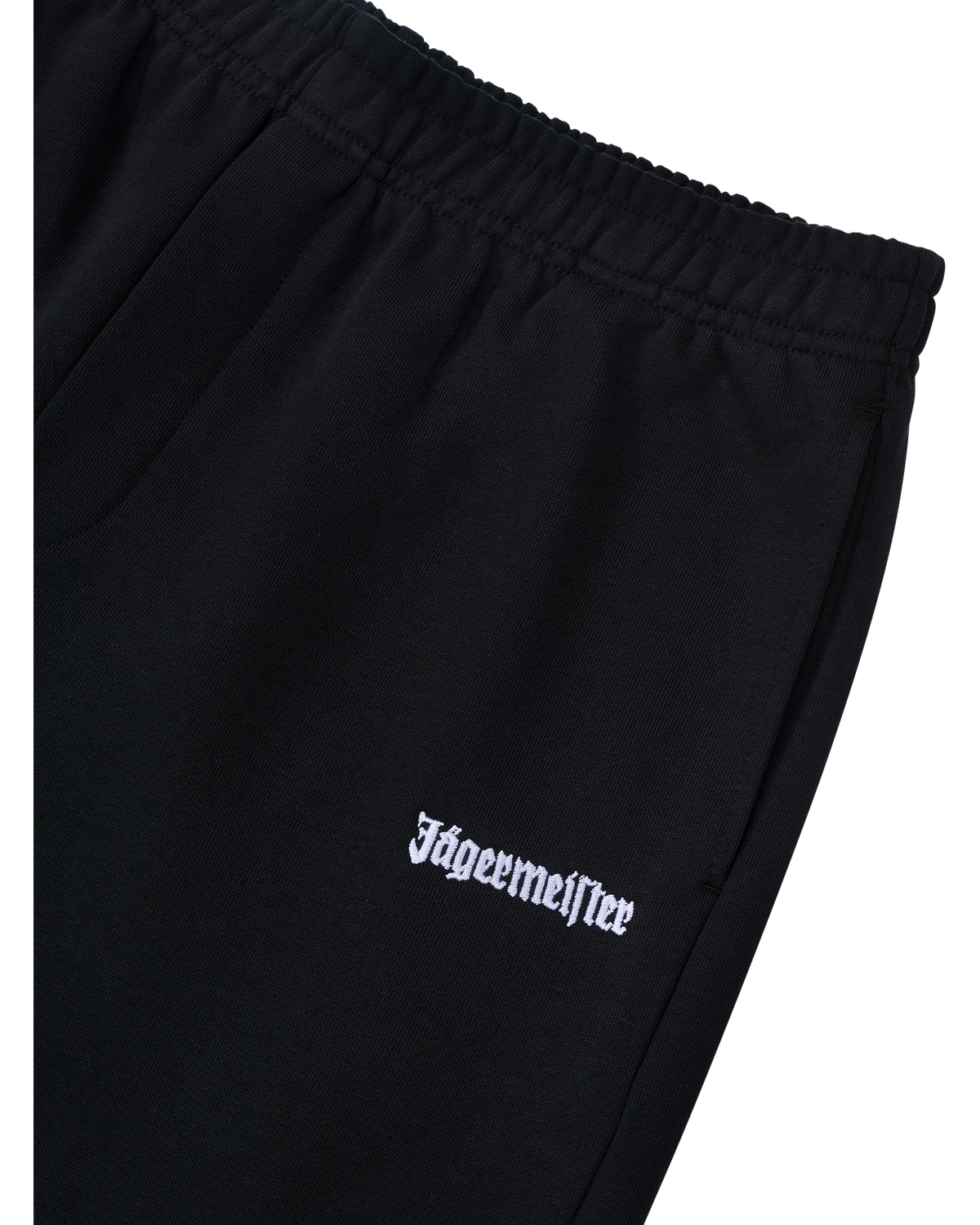 Black pants with white Jägermeister logo on the front.
